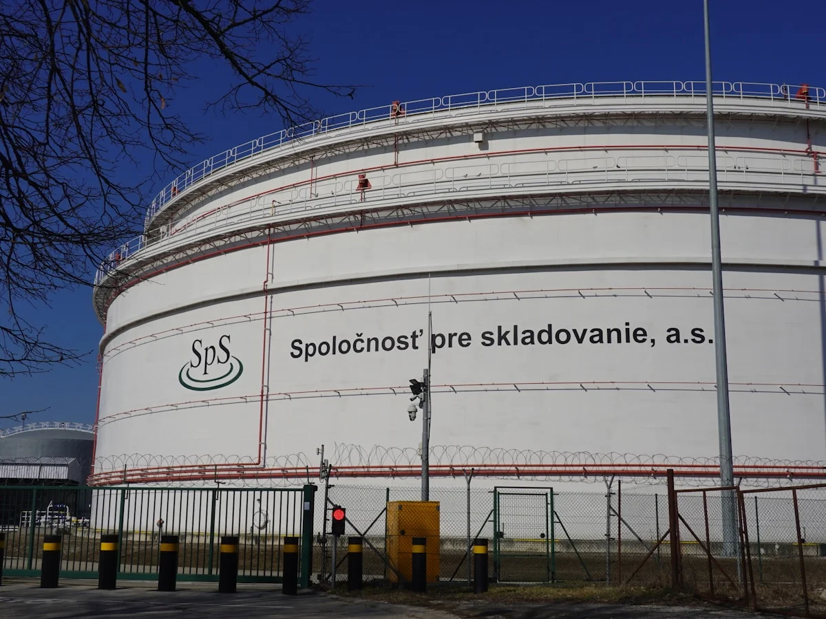 Fuel tanker delivering to industrial site