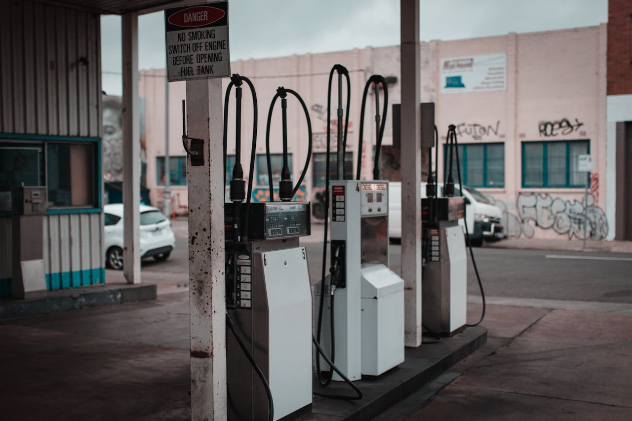 hero Empty gas station with visible graffiti in Collingwood, Australia.
